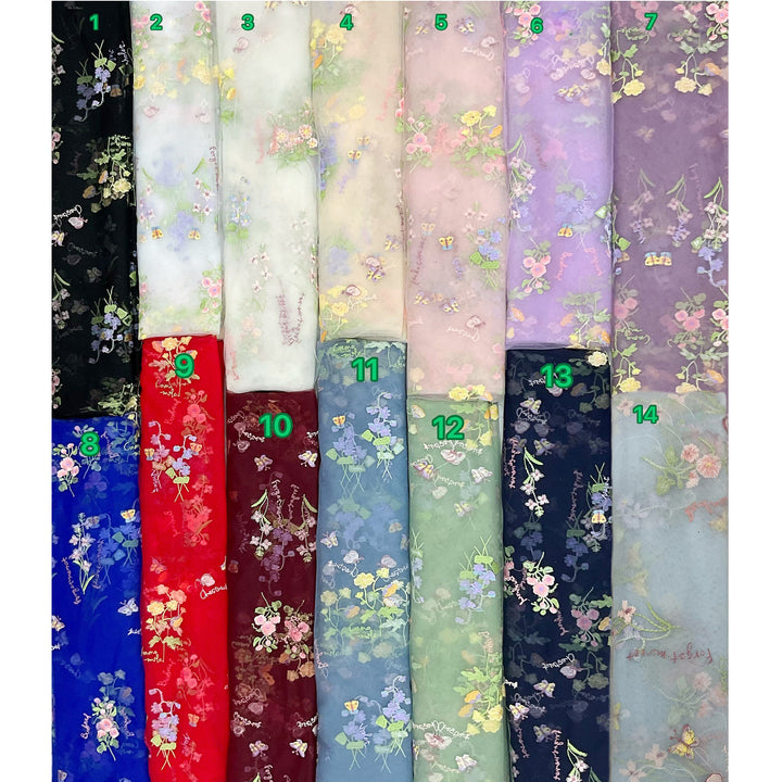 14 color samples of floral embroidered fabric.This is an Ananke dress color-options reference image rather than a single product photo, so subject type is Color Swatch.