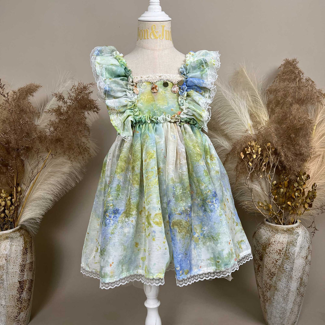A mannequin displays an Adrasteia 3D floral lace trim dress. 