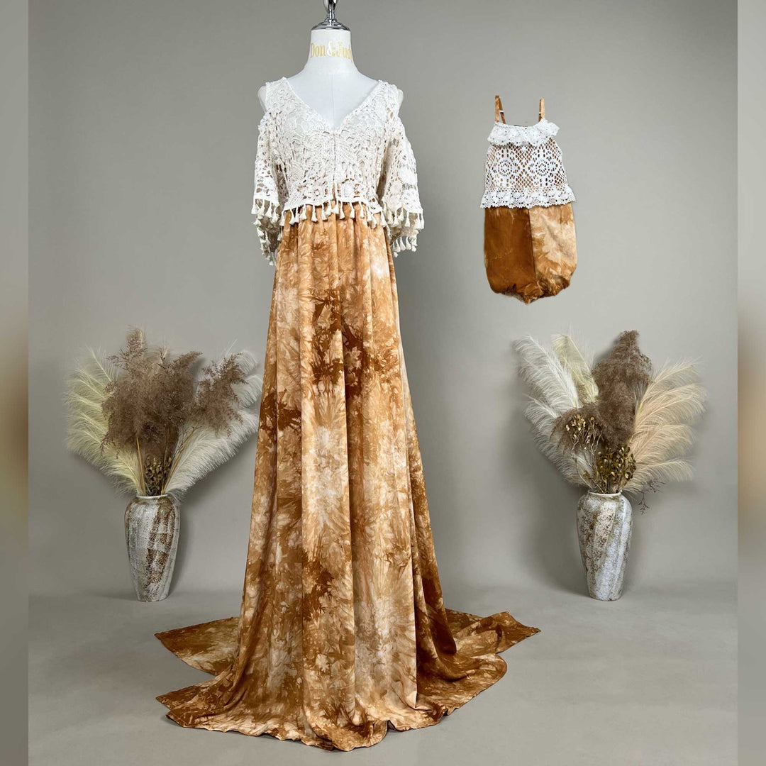 A mannequin displays a Circe coffee tie-dye gown with a white crochet top and matching baby romper.